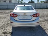 ✅ 2018 Chevrolet Cruze LS • VIN: 1G1BC5SM1J7205440 • Lot: 66359193. Listed on Copart with 15,435 mi. Free auction sales archive from the USA and detailed vehicle history report at DreamBid. Image 6.