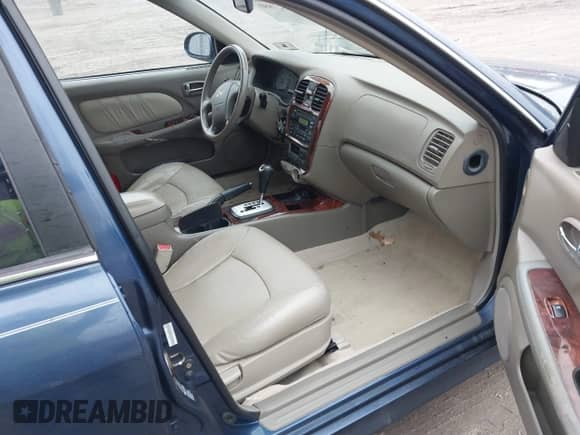 2004 Hyundai Sonata GLS z VIN KMHWF35H94A065434, wystawiony jako IAAI lot #41527880 z przebiegiem 137 357 mil mil oraz . Historia ofert i sprzedaży dostępna na DreamBid. Obrazek 5.