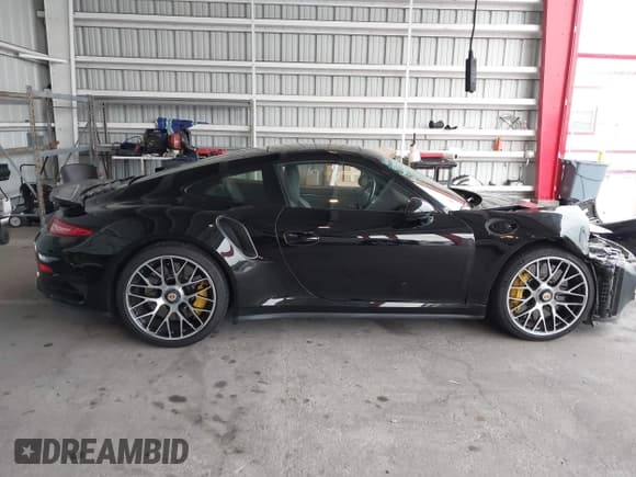 ✅ 2014 Porsche 911 Turbo • VIN: WP0AD2A90ES167293 • Lot: 43173870. Listed on IAAI with 25,383 mi. Free auction sales archive from the USA and detailed vehicle history report at DreamBid. Image 14.