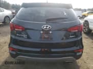 ✅ 2018 Hyundai Santa Fe 2.4L • VIN: 5NMZT3LB5JH069006 • Лот: 37106213. Опубликован ранее на Copart с пробегом 63 120 миль. Бесплатный доступ к архиву аукционных продаж из США и подробный отчёт об истории автомобиля на DreamBid. Изображение 6.