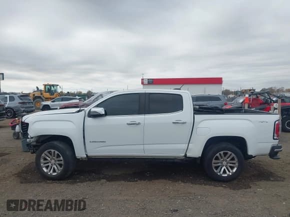 ✅ 2017 GMC Canyon 4WD SLT • VIN: 1GTG6DEN6H1249790 • Лот: 43609704. Опубликован ранее на IAAI с пробегом 141 693 миль. Бесплатный доступ к архиву аукционных продаж из США и подробный отчёт об истории автомобиля на DreamBid. Изображение 15.