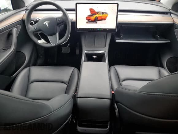 ✅ 2023 Tesla Model Y Long Range • VIN: 7SAYGDEE3PF751019 • Лот: 57972885. Опубликован ранее на Copart с пробегом 24 591 миль. Бесплатный доступ к архиву аукционных продаж из США и подробный отчёт об истории автомобиля на DreamBid. Изображение 8.