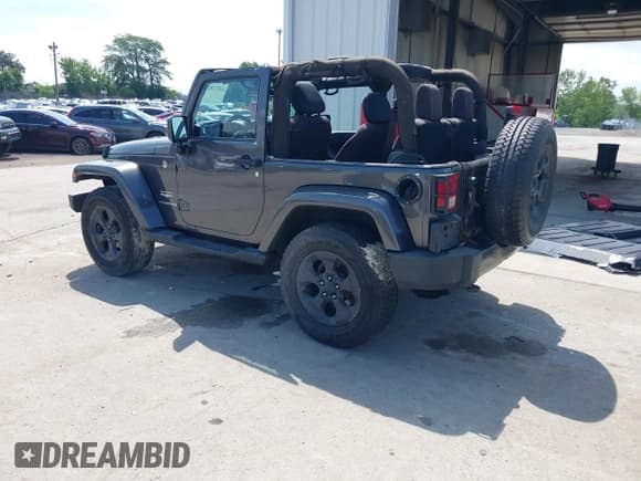 ✅ 2014 Jeep Wrangler Sahara • VIN: 1C4GJWBG0EL240812 • Lot: 42812932. Listed on IAAI with 130,313 mi. Free auction sales archive from the USA and detailed vehicle history report at DreamBid. Image 3.