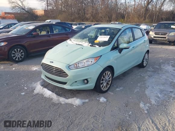 ✅ 2017 Ford Fiesta Titanium • VIN: 3FADP4FJ4HM123934 • Lot: 43870655. Wystawiony na IAAI z przebiegiem 134 390 mil. Bezpłatny archiwum sprzedaży aukcyjnych z USA i szczegółowy raport historii pojazdu na DreamBid. Zdjęcie 2.