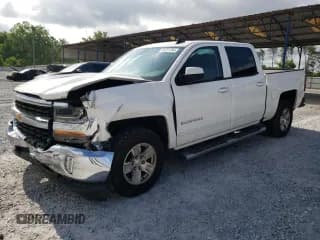 ✅ 2018 Chevrolet Silverado 1500 LT • VIN: 3GCUCRER7JG176951 • Лот: 54731784. Опубликован ранее на Copart с пробегом 123 075 миль. Бесплатный доступ к архиву аукционных продаж из США и подробный отчёт об истории автомобиля на DreamBid. Изображение 1.
