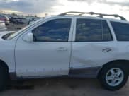 ✅ 2004 Hyundai Santa Fe GLS • VIN: KM8SC13E44U672070 • Lot: 43383997. Listed on IAAI with 219,150 mi. Free auction sales archive from the USA and detailed vehicle history report at DreamBid. Image 14.