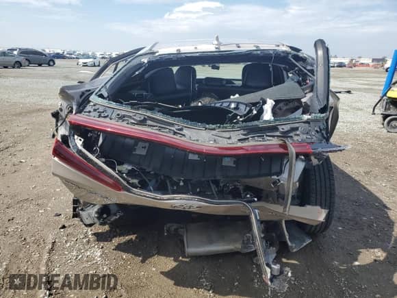 2021 Toyota Prius LE z VIN JTDKAMFP6M3186049, wystawiony jako Copart lot #81289905 z przebiegiem 271 061 mil mil oraz Szkoda całkowita • Salvage title. Historia ofert i sprzedaży dostępna na DreamBid. Obrazek 6.