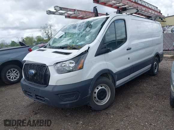✅ 2021 Ford Transit Cargo • VIN: 1FTYE1Y86MKA71783 • Lot: 42183454. Listed on IAAI with 53,405 mi. Free auction sales archive from the USA and detailed vehicle history report at DreamBid. Image 2.