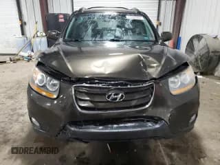 ✅ 2011 Hyundai Santa Fe SE • VIN: 5XYZHDAG8BG061824 • Lot: 77025964. Listed on Copart with 149,741 mi. Free auction sales archive from the USA and detailed vehicle history report at DreamBid. Image 5.