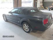 ✅ 2007 Ford Mustang Deluxe • VIN: 1ZVHT84N575330273 • Lot: 43074318. Listed on IAAI with 101,913 mi. Free auction sales archive from the USA and detailed vehicle history report at DreamBid. Image 3.