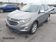 ✅ 2018 Chevrolet Equinox Premier • VIN: 3GNAXMEV7JS547991 • Лот: 41208640. Опубликован ранее на IAAI с пробегом 98 879 миль. Бесплатный доступ к архиву аукционных продаж из США и подробный отчёт об истории автомобиля на DreamBid. Изображение 2.