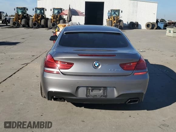 ✅ 2013 BMW 6 Series 650i • VIN: WBAYM9C57DDW20343 • Лот: 91125745. Опубликован ранее на Copart с пробегом Не указан. Бесплатный доступ к архиву аукционных продаж из США и подробный отчёт об истории автомобиля на DreamBid. Изображение 6.