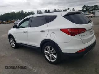 ✅ 2015 Hyundai Santa Fe • VIN: 5XYZW4LA5FG239287 • Лот: 70058543. Опубликован ранее на Copart с пробегом 99 948 миль. Бесплатный доступ к архиву аукционных продаж из США и подробный отчёт об истории автомобиля на DreamBid. Изображение 2.