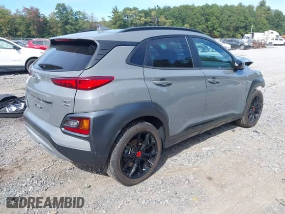 2021 Hyundai Kona Night Edition z VIN KM8K6CA52MU726553, wystawiony jako IAAI lot #43367831 z przebiegiem 33 710 mil mil oraz . Historia ofert i sprzedaży dostępna na DreamBid. Obrazek 4.