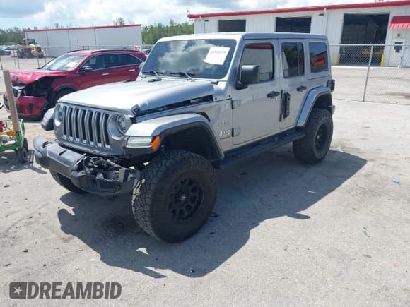 ✅ 2021 Jeep Wrangler Unlimited Sahara • VIN: 1C4HJXEN9MW637288 • Lot: 42553459. Listed on IAAI with 39,362 mi. Free auction sales archive from the USA and detailed vehicle history report at DreamBid. Image 2.