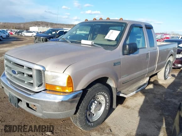 ✅ 1999 Ford F-250 XL • VIN: 1FTNX20FXXEF09561 • Lot: 41717288. Listed on IAAI with 203,416 mi. Free auction sales archive from the USA and detailed vehicle history report at DreamBid. Image 2.