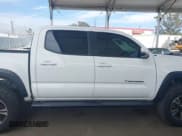 ✅ 2021 Toyota Tacoma SR • VIN: 3TMCZ5AN0MM387565 • Lot: 42300520. Listed on IAAI with 42,153 mi. Free auction sales archive from the USA and detailed vehicle history report at DreamBid. Image 13.