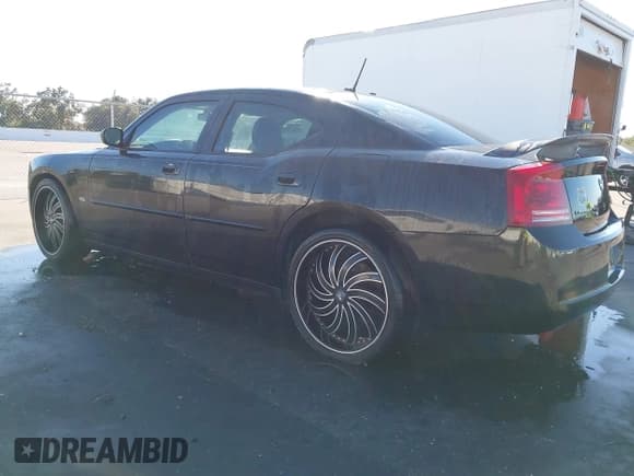 ✅ 2008 Dodge Charger SXT • VIN: 2B3KA33G08H108398 • Lot: 43694032. Listed on IAAI with 189,985 mi. Free auction sales archive from the USA and detailed vehicle history report at DreamBid. Image 3.