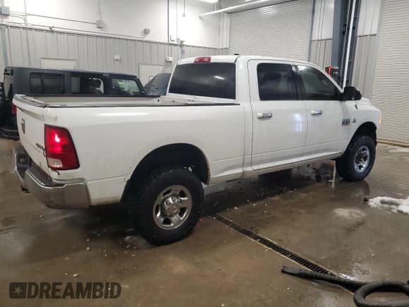 ✅ 2011 Ram 2500 Laramie • VIN: 3D7UT2CLXBG575253 • Lot: 86850224. Listed on Copart with 269,057 mi. Free auction sales archive from the USA and detailed vehicle history report at DreamBid. Image 3.