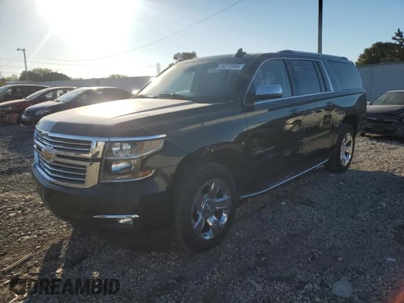 ✅ 2018 Chevrolet Suburban Premier • VIN: 1GNSKJKCXJR125754 • Lot: 74512554. Listed on Copart with 107,276 mi. Free auction sales archive from the USA and detailed vehicle history report at DreamBid. Image 1.
