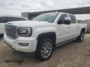 ✅ 2016 GMC Sierra 1500 Denali • VIN: 3GTU2PEJ8GG368793 • Lot: 91400465. Listed on Copart with 103,984 mi. Free auction sales archive from the USA and detailed vehicle history report at DreamBid. Image 1.