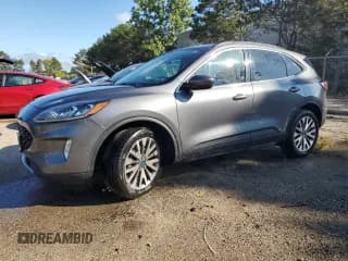 ✅ 2021 Ford Escape Titanium • VIN: 1FMCU9J99MUA57746 • Lot: 84167555. Wystawiony na Copart z przebiegiem 109 135 mil. Bezpłatny archiwum sprzedaży aukcyjnych z USA i szczegółowy raport historii pojazdu na DreamBid. Zdjęcie 1.
