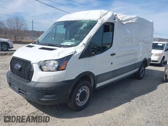 ✅ 2024 Ford Transit Cargo • VIN: 1FTBR1C8XRKA46961 • Lot: 41823255. Listed on IAAI with 4,292 mi. Free auction sales archive from the USA and detailed vehicle history report at DreamBid. Image 2.