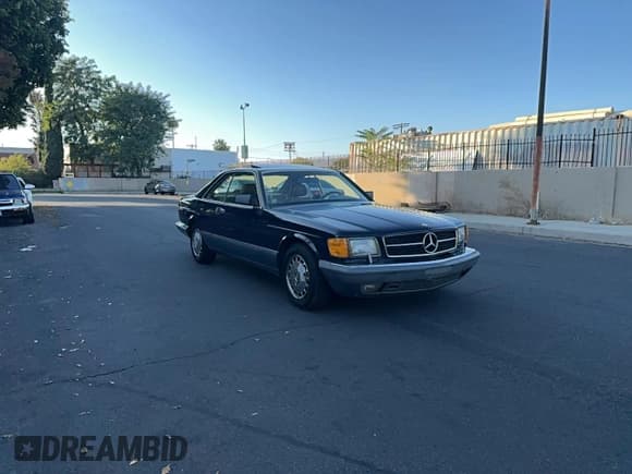 ✅ 1988 Mercedes-Benz 560 560SEC • VIN: WDBCA45D2JA417577 • Lot: 92130215. Listed on Copart with 122,971 mi. Free auction sales archive from the USA and detailed vehicle history report at DreamBid. Image 1.