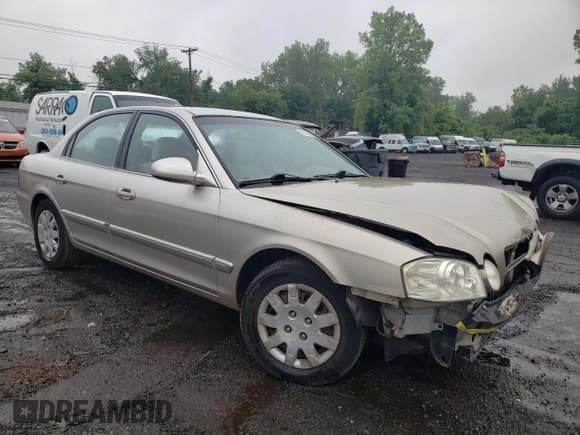 ✅ 2006 Kia Optima LX • VIN: KNAGD126065465879 • Лот: 59270285. Опубликован ранее на Copart с пробегом 139 174 миль. Бесплатный доступ к архиву аукционных продаж из США и подробный отчёт об истории автомобиля на DreamBid. Изображение 4.