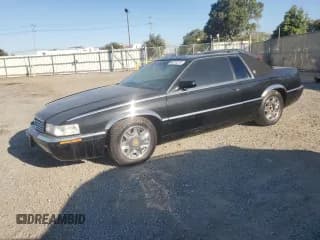 ✅ 2001 Cadillac Eldorado ESC • VIN: 1G6EL12Y21B105623 • Lot: 80270274. Wystawiony na Copart z przebiegiem 100 143 mil. Bezpłatny archiwum sprzedaży aukcyjnych z USA i szczegółowy raport historii pojazdu na DreamBid. Zdjęcie 1.