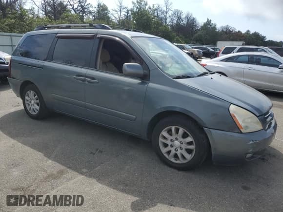 ✅ 2006 Kia Sedona LX • VIN: KNDMB233566031182 • Lot: 69612145. Listed on Copart with 163,729 mi. Free auction sales archive from the USA and detailed vehicle history report at DreamBid. Image 4.