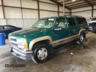 1999 Chevrolet Suburban z VIN 1GNFK16R1XJ386729, wystawiony jako Copart lot #80654155 z przebiegiem 180 019 mil mil oraz Szkoda całkowita • Salvage title. Historia ofert i sprzedaży dostępna na DreamBid. Obrazek 1.