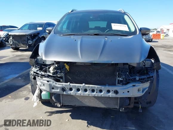 ✅ 2014 Ford Escape Titanium • VIN: 1FMCU0J92EUE55006 • Lot: 43559574. Wystawiony na IAAI z przebiegiem 98 269 mil. Bezpłatny archiwum sprzedaży aukcyjnych z USA i szczegółowy raport historii pojazdu na DreamBid. Zdjęcie 6.