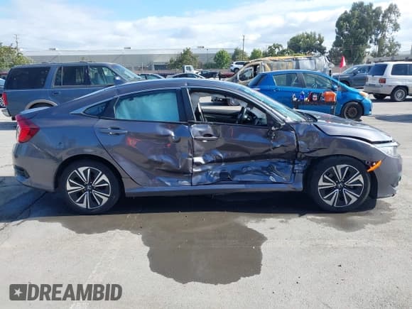 ✅ 2016 Honda Civic EX-L • VIN: 19XFC1F75GE206542 • Lot: 43412893. Listed on IAAI with 111,076 mi. Free auction sales archive from the USA and detailed vehicle history report at DreamBid. Image 13.