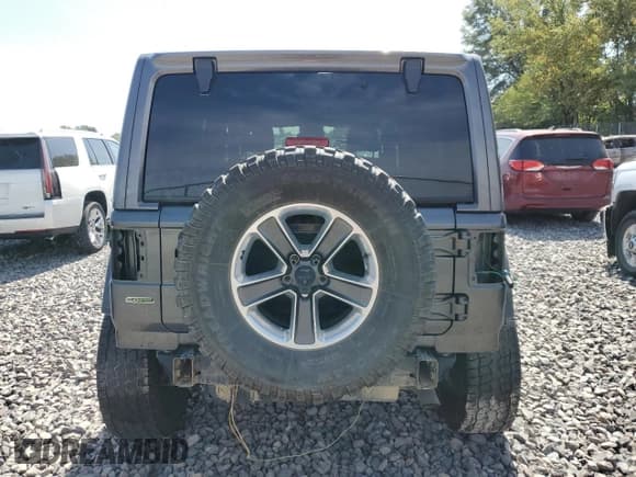 ✅ 2020 Jeep Wrangler Unlimited Sahara • VIN: 1C4HJXEM3LW336988 • Lot: 65573155. Listed on Copart with 92,556 mi. Free auction sales archive from the USA and detailed vehicle history report at DreamBid. Image 6.