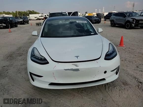 ✅ 2020 Tesla Model 3 Standard Range Plus • VIN: 5YJ3E1EA8LF614404 • Лот: 82043055. Опубликован ранее на Copart с пробегом 85 112 миль. Бесплатный доступ к архиву аукционных продаж из США и подробный отчёт об истории автомобиля на DreamBid. Изображение 13.