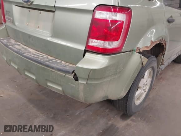 ✅ 2008 Ford Escape XLT • VIN: 1FMCU03148KB16125 • Lot: 43412242. Listed on IAAI with 241,799 mi. Free auction sales archive from the USA and detailed vehicle history report at DreamBid. Image 6.