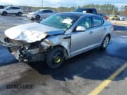 ✅ 2011 Kia Optima EX • VIN: KNAGN4A75B5104859 • Lot: 43793912. Listed on IAAI with 148,599 mi. Free auction sales archive from the USA and detailed vehicle history report at DreamBid. Image 2.