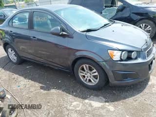 2012 Chevrolet Sonic LS with VIN 1G1JA5SH4C4231023, listed as a IAAI auction lot 42782087 with 99,229 mi miles and . Bid and sale history available at DreamBid. Image 1.