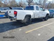 ✅ 2021 Toyota Tacoma SR • VIN: 3TYSZ5ANXMT010581 • Lot: 41933103. Listed on IAAI with 102,828 mi. Free auction sales archive from the USA and detailed vehicle history report at DreamBid. Image 4.