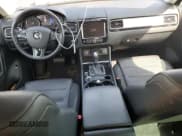 ✅ 2013 Volkswagen Touareg Exec • VIN: WVGEF9BP2DD000126 • Lot: 54430375. Listed on Copart with 111,677 mi. Free auction sales archive from the USA and detailed vehicle history report at DreamBid. Image 8.