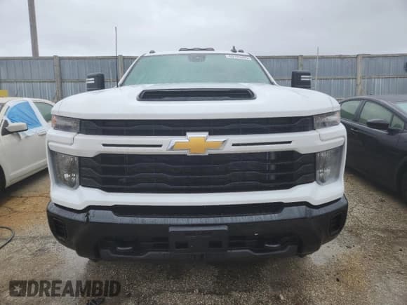 ✅ 2024 Chevrolet Silverado 2500HD Custom • VIN: 2GC4YME72R1211032 • Лот: 69109005. Опубликован ранее на Copart с пробегом 9 099 миль. Бесплатный доступ к архиву аукционных продаж из США и подробный отчёт об истории автомобиля на DreamBid. Изображение 5.