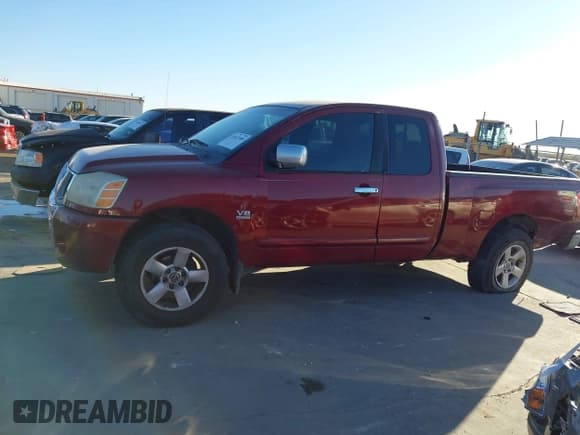 ✅ 2004 Nissan Titan XE • VIN: 1N6AA06A44N544167 • Lot: 43667008. Listed on IAAI with 209,919 mi. Free auction sales archive from the USA and detailed vehicle history report at DreamBid. Image 14.
