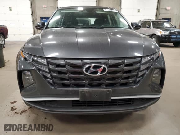 ✅ 2022 Hyundai Tucson SE • VIN: 5NMJACAE1NH079800 • Lot: 87449515. Listed on Copart with 62,447 mi. Free auction sales archive from the USA and detailed vehicle history report at DreamBid. Image 5.
