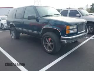 ✅ 1995 GMC Yukon • VIN: 1GKEK13K6SJ765797 • Lot: 41905542. Listed on IAAI with 212,207 mi. Free auction sales archive from the USA and detailed vehicle history report at DreamBid. Image 1.