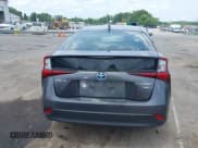 ✅ 2021 Toyota Prius L Eco • VIN: JTDKAMFU3M3152785 • Lot: 42501351. Listed on IAAI with 60,489 mi. Free auction sales archive from the USA and detailed vehicle history report at DreamBid. Image 16.