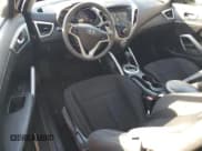 ✅ 2014 Hyundai Veloster • VIN: KMHTC6AD8EU195107 • Lot: 42056915. Wystawiony na Copart z przebiegiem 94 203 mil. Bezpłatny archiwum sprzedaży aukcyjnych z USA i szczegółowy raport historii pojazdu na DreamBid. Zdjęcie 8.