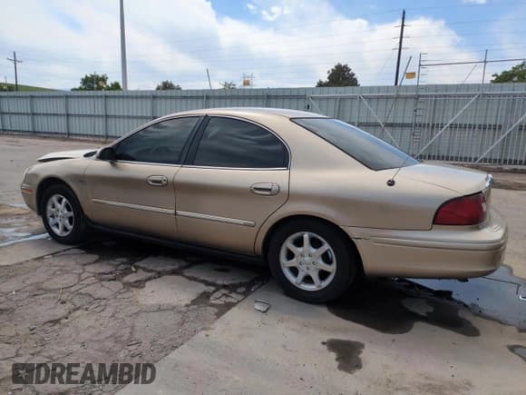 ✅ 2001 Mercury Sable LS Premium • VIN: 1MEHM55S51A604989 • Lot: 57890935. Listed on Copart with 113,793 mi. Free auction sales archive from the USA and detailed vehicle history report at DreamBid. Image 2.