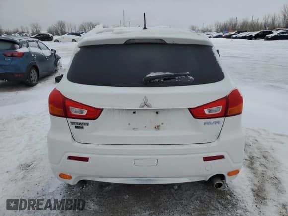 ✅ 2012 Mitsubishi Outlander Sport SE • VIN: JA4AJ3AU2CZ604051 • Lot: 84172804. Listed on Copart with 143,008 mi. Free auction sales archive from the USA and detailed vehicle history report at DreamBid. Image 6.