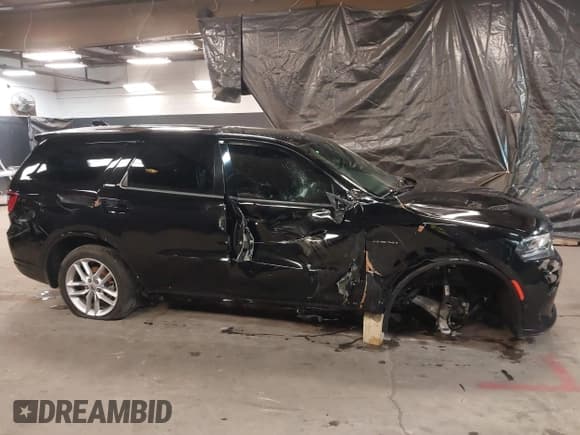 ✅ 2022 Dodge Durango R/T • VIN: 1C4SDHCT2NC224281 • Lot: 41232204. Listed on IAAI with 50,748 mi. Free auction sales archive from the USA and detailed vehicle history report at DreamBid. Image 13.